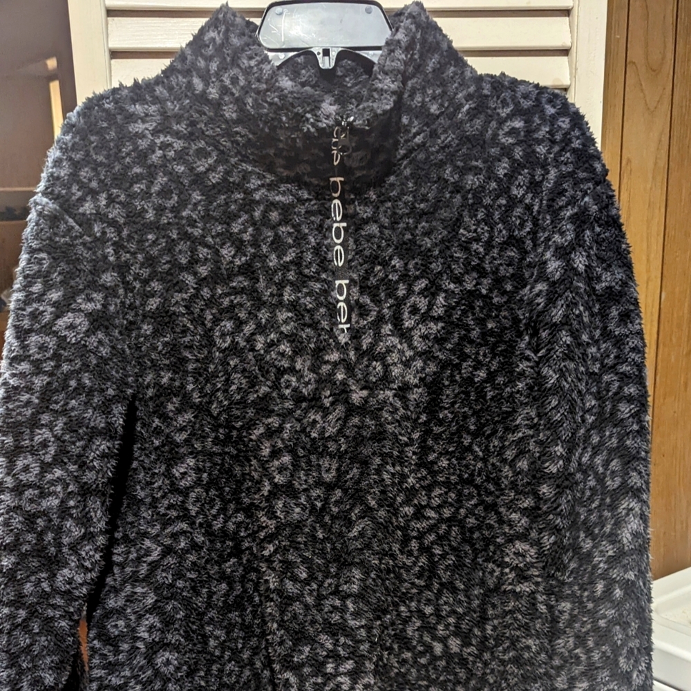 Bebe Sport black and gray furry leopard print quarter zip sweater. Size XL